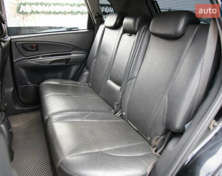 Черный Хендай Туксон, объемом двигателя 2.66 л и пробегом 217 тыс. км за 8600 $, фото 7 на Automoto.ua