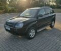 Чорний Хендай Туксон, об'ємом двигуна 2 л та пробігом 228 тис. км за 7800 $, фото 1 на Automoto.ua