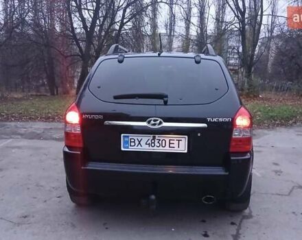 Черный Хендай Туксон, объемом двигателя 1.98 л и пробегом 320 тыс. км за 6300 $, фото 12 на Automoto.ua