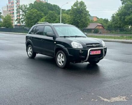 Черный Хендай Туксон, объемом двигателя 1.98 л и пробегом 230 тыс. км за 7800 $, фото 7 на Automoto.ua