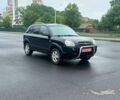 Черный Хендай Туксон, объемом двигателя 1.98 л и пробегом 230 тыс. км за 7800 $, фото 7 на Automoto.ua