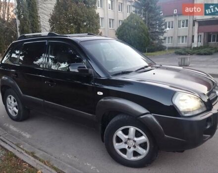 Чорний Хендай Туксон, об'ємом двигуна 1.99 л та пробігом 239 тис. км за 6990 $, фото 4 на Automoto.ua