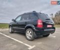 Черный Хендай Туксон, объемом двигателя 2 л и пробегом 127 тыс. км за 7590 $, фото 2 на Automoto.ua