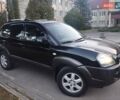 Чорний Хендай Туксон, об'ємом двигуна 1.99 л та пробігом 239 тис. км за 6990 $, фото 4 на Automoto.ua