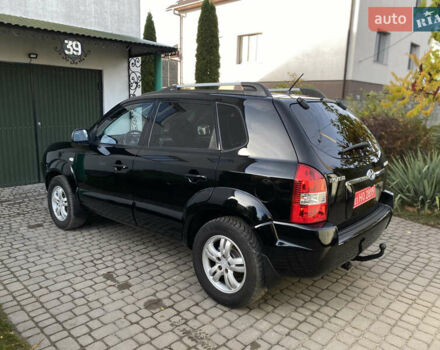 Чорний Хендай Туксон, об'ємом двигуна 1.98 л та пробігом 233 тис. км за 7650 $, фото 7 на Automoto.ua
