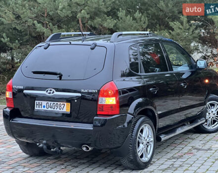 Чорний Хендай Туксон, об'ємом двигуна 1.98 л та пробігом 170 тис. км за 6999 $, фото 44 на Automoto.ua