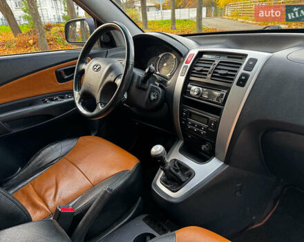 Черный Хендай Туксон, объемом двигателя 2 л и пробегом 210 тыс. км за 7990 $, фото 30 на Automoto.ua