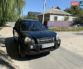 Черный Хендай Туксон, объемом двигателя 2 л и пробегом 255 тыс. км за 7150 $, фото 4 на Automoto.ua