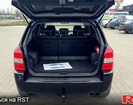 Черный Хендай Туксон, объемом двигателя 2 л и пробегом 200 тыс. км за 7800 $, фото 11 на Automoto.ua