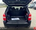 Черный Хендай Туксон, объемом двигателя 2 л и пробегом 200 тыс. км за 7800 $, фото 11 на Automoto.ua