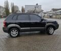 Чорний Хендай Туксон, об'ємом двигуна 2 л та пробігом 270 тис. км за 7500 $, фото 5 на Automoto.ua