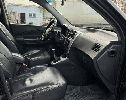 Черный Хендай Туксон, объемом двигателя 1.98 л и пробегом 198 тыс. км за 7500 $, фото 15 на Automoto.ua