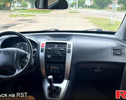 Черный Хендай Туксон, объемом двигателя 2 л и пробегом 192 тыс. км за 7700 $, фото 7 на Automoto.ua