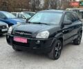 Чорний Хендай Туксон, об'ємом двигуна 2 л та пробігом 167 тис. км за 7950 $, фото 1 на Automoto.ua