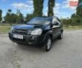 Чорний Хендай Туксон, об'ємом двигуна 2 л та пробігом 249 тис. км за 5800 $, фото 3 на Automoto.ua
