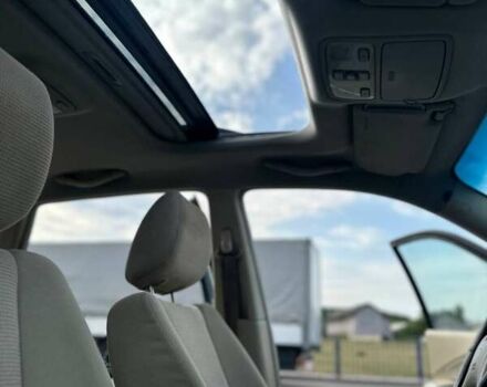 Черный Хендай Туксон, объемом двигателя 1.98 л и пробегом 277 тыс. км за 5350 $, фото 6 на Automoto.ua