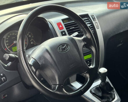 Хендай Туксон 2006 у Тернополі на Automoto.ua Чорний Хендай Туксон, об'ємом двигуна 2 л та пробігом 240 тис. км за 6699 $, фото 33 на Automoto.ua