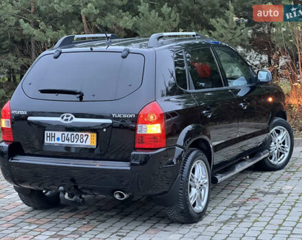Чорний Хендай Туксон, об'ємом двигуна 1.98 л та пробігом 170 тис. км за 6999 $, фото 57 на Automoto.ua