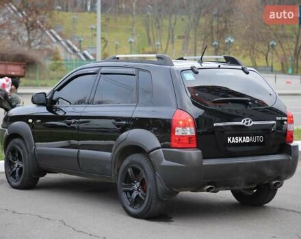Черный Хендай Туксон, объемом двигателя 2.66 л и пробегом 217 тыс. км за 8600 $, фото 3 на Automoto.ua