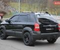 Черный Хендай Туксон, объемом двигателя 2.66 л и пробегом 217 тыс. км за 8600 $, фото 3 на Automoto.ua