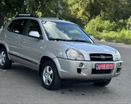 Черный Хендай Туксон, объемом двигателя 2 л и пробегом 266 тыс. км за 7700 $, фото 8 на Automoto.ua