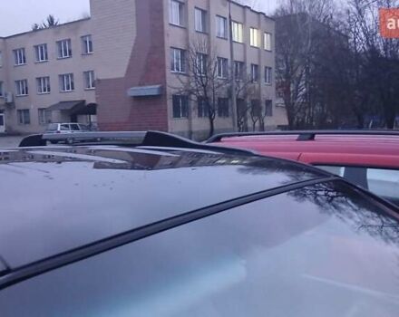 Черный Хендай Туксон, объемом двигателя 1.98 л и пробегом 320 тыс. км за 6300 $, фото 17 на Automoto.ua