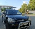 Черный Хендай Туксон, объемом двигателя 2 л и пробегом 162 тыс. км за 8000 $, фото 2 на Automoto.ua
