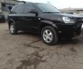 Чорний Хендай Туксон, об'ємом двигуна 2 л та пробігом 270 тис. км за 7200 $, фото 1 на Automoto.ua