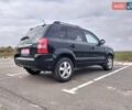 Черный Хендай Туксон, объемом двигателя 2 л и пробегом 127 тыс. км за 7590 $, фото 11 на Automoto.ua