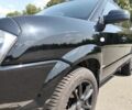 Черный Хендай Туксон, объемом двигателя 2 л и пробегом 178 тыс. км за 7600 $, фото 12 на Automoto.ua