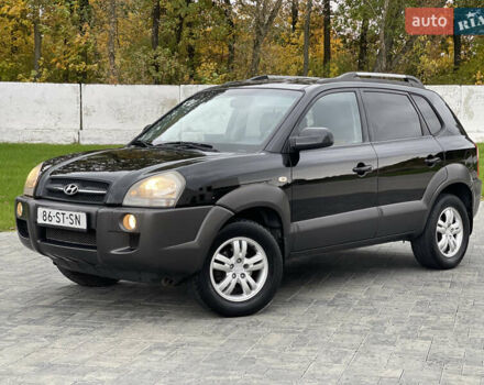Черный Хендай Туксон, объемом двигателя 2 л и пробегом 216 тыс. км за 7500 $, фото 1 на Automoto.ua