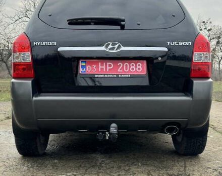 Черный Хендай Туксон, объемом двигателя 2 л и пробегом 201 тыс. км за 7750 $, фото 8 на Automoto.ua