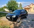 Чорний Хендай Туксон, об'ємом двигуна 2 л та пробігом 180 тис. км за 7600 $, фото 1 на Automoto.ua