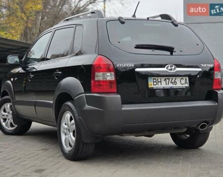 Чорний Хендай Туксон, об'ємом двигуна 1.98 л та пробігом 123 тис. км за 7950 $, фото 1 на Automoto.ua