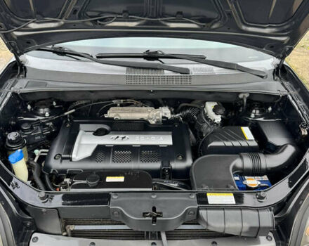 Черный Хендай Туксон, объемом двигателя 2 л и пробегом 201 тыс. км за 7750 $, фото 28 на Automoto.ua