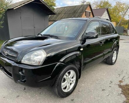 Черный Хендай Туксон, объемом двигателя 2 л и пробегом 163 тыс. км за 7700 $, фото 1 на Automoto.ua