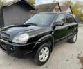 Черный Хендай Туксон, объемом двигателя 2 л и пробегом 163 тыс. км за 7700 $, фото 1 на Automoto.ua