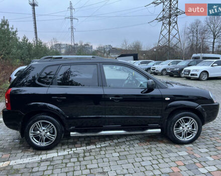 Чорний Хендай Туксон, об'ємом двигуна 1.98 л та пробігом 170 тис. км за 6999 $, фото 33 на Automoto.ua