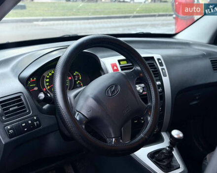 Чорний Хендай Туксон, об'ємом двигуна 1.99 л та пробігом 310 тис. км за 6399 $, фото 16 на Automoto.ua
