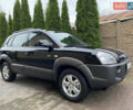 Черный Хендай Туксон, объемом двигателя 1.99 л и пробегом 186 тыс. км за 9400 $, фото 2 на Automoto.ua