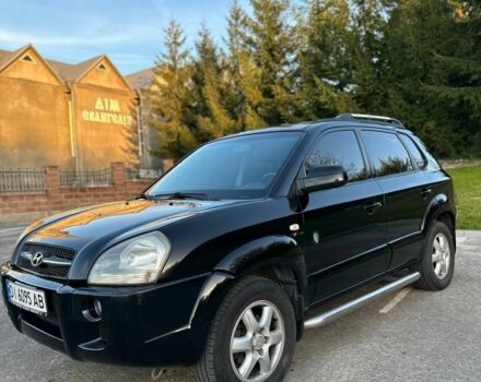 Чорний Хендай Туксон, об'ємом двигуна 2 л та пробігом 235 тис. км за 6700 $, фото 2 на Automoto.ua