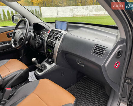 Черный Хендай Туксон, объемом двигателя 2 л и пробегом 216 тыс. км за 7500 $, фото 33 на Automoto.ua