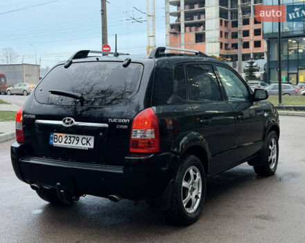 Чорний Хендай Туксон, об'ємом двигуна 1.99 л та пробігом 310 тис. км за 6399 $, фото 18 на Automoto.ua