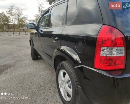 Черный Хендай Туксон, объемом двигателя 2 л и пробегом 237 тыс. км за 7999 $, фото 44 на Automoto.ua