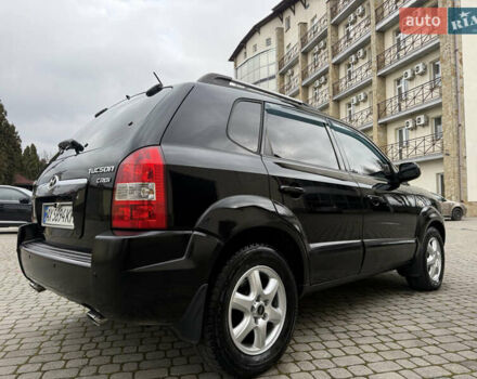 Черный Хендай Туксон, объемом двигателя 1.98 л и пробегом 250 тыс. км за 7150 $, фото 6 на Automoto.ua
