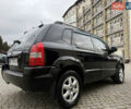 Черный Хендай Туксон, объемом двигателя 1.98 л и пробегом 250 тыс. км за 7150 $, фото 6 на Automoto.ua