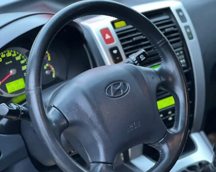 Чорний Хендай Туксон, об'ємом двигуна 1.98 л та пробігом 170 тис. км за 6999 $, фото 37 на Automoto.ua