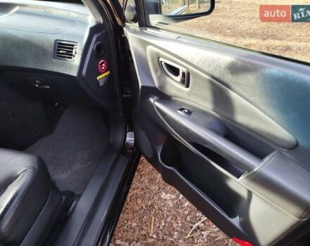 Чорний Хендай Туксон, об'ємом двигуна 1.98 л та пробігом 195 тис. км за 8200 $, фото 2 на Automoto.ua