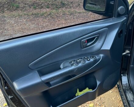 Черный Хендай Туксон, объемом двигателя 2 л и пробегом 210 тыс. км за 7200 $, фото 5 на Automoto.ua