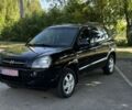 Черный Хендай Туксон, объемом двигателя 2 л и пробегом 266 тыс. км за 7700 $, фото 1 на Automoto.ua
